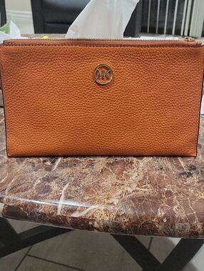 Michael Kors Orange Pebbled Leather Zip Pouch with Gold MK Logo
